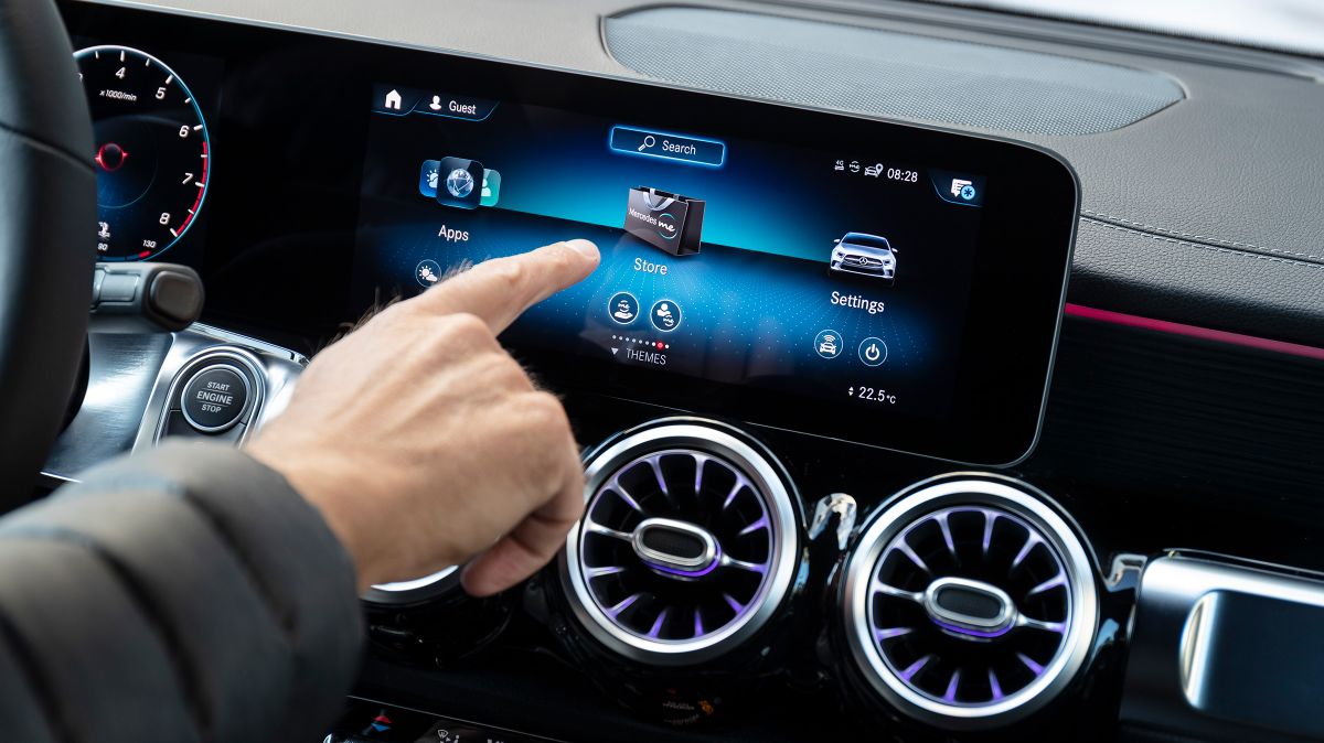 Human interacting with mercedes benz in car user interface